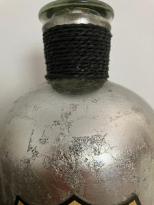 Glass and Silver Bottle